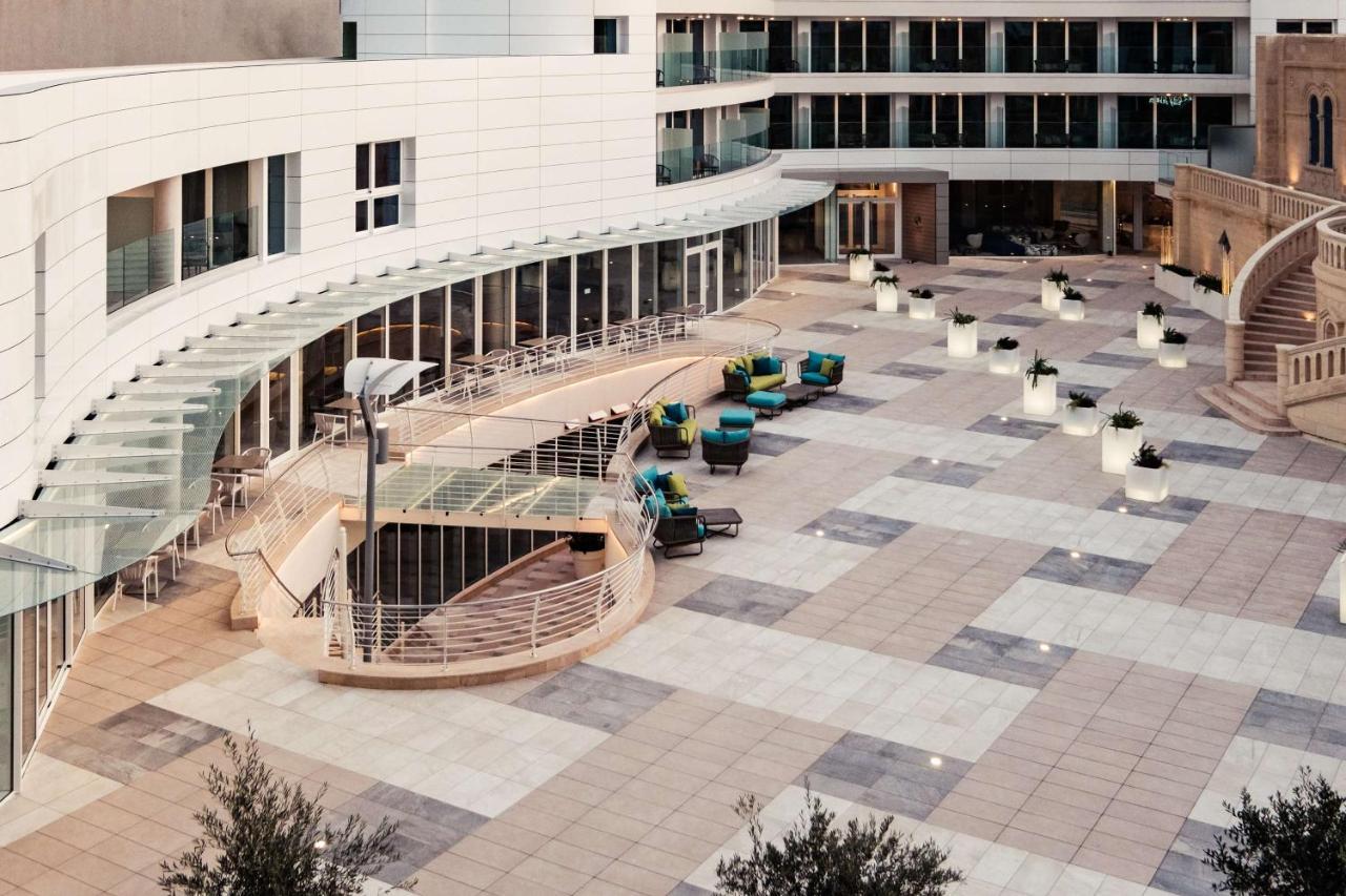 Hotel Hyatt Regency Malta San Giuliano Esterno foto The courtyard of the new building
